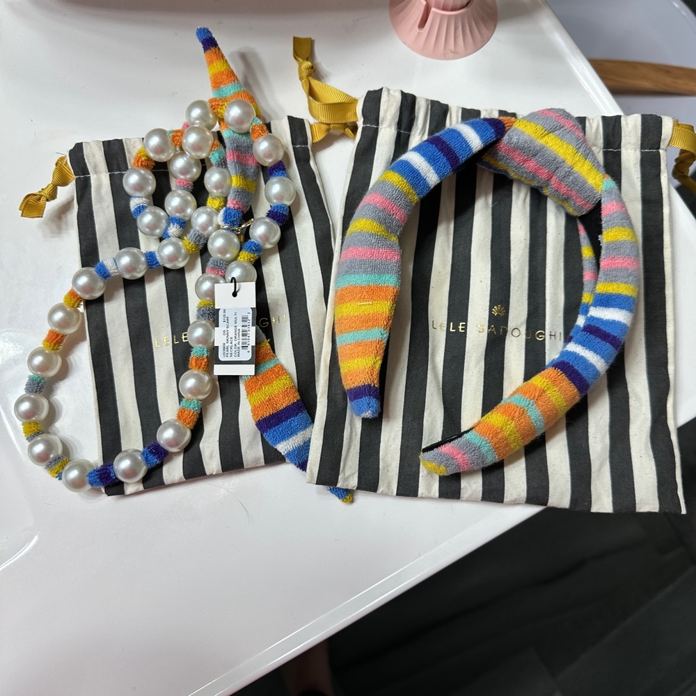 Lele Sadoughi headband and pearl necklace set. Striped terry cloth.